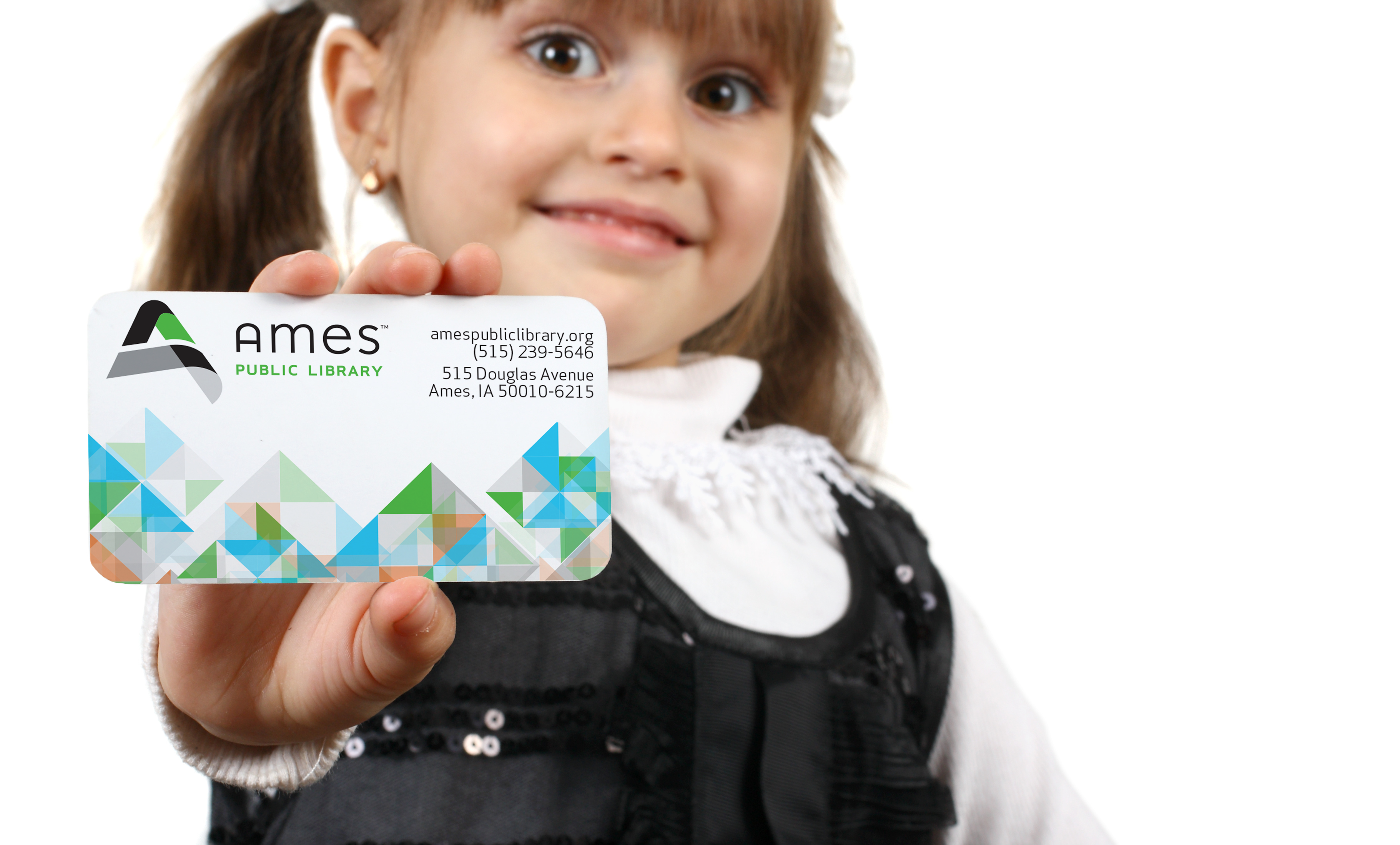 Child with Ames Public Library Card