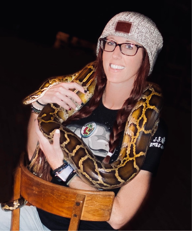 Photo of Lindsey McDermott with a snake
