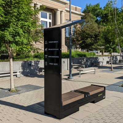 Solar Charging and Connectivity Station Bench in front of Ames Public Library