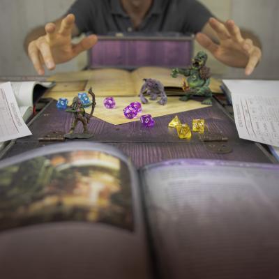 Photo of RPG books, dice, and miniatures