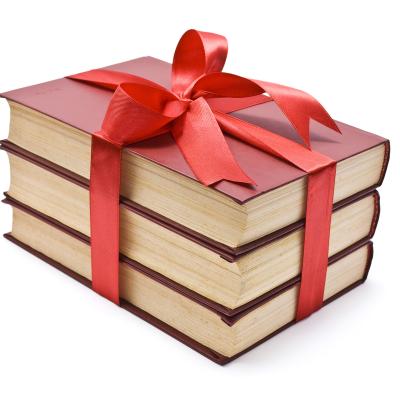 Books wrapped with a ribbon