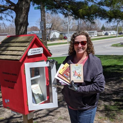 Sarah Refilling Little Free Library