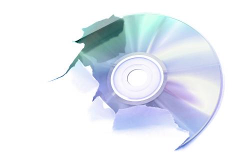 DVD Tearing Through Paper