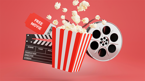 Image of "free movie" ticket, clapboard, popcorn, and film reel