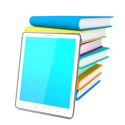 Tablet Leaning on Stack of Colorful Books