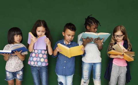 Children holding books