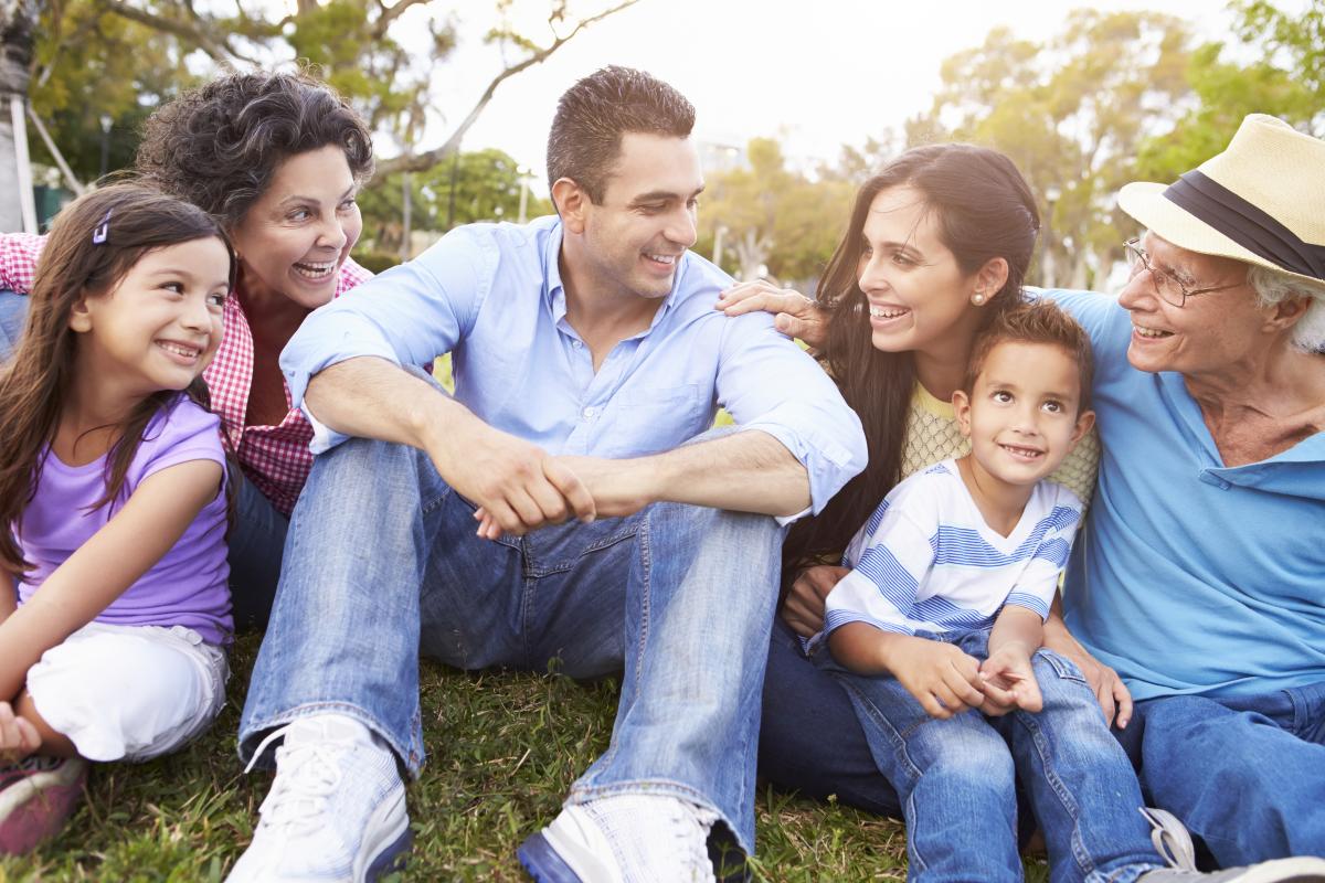 Multiple generations sitting in park